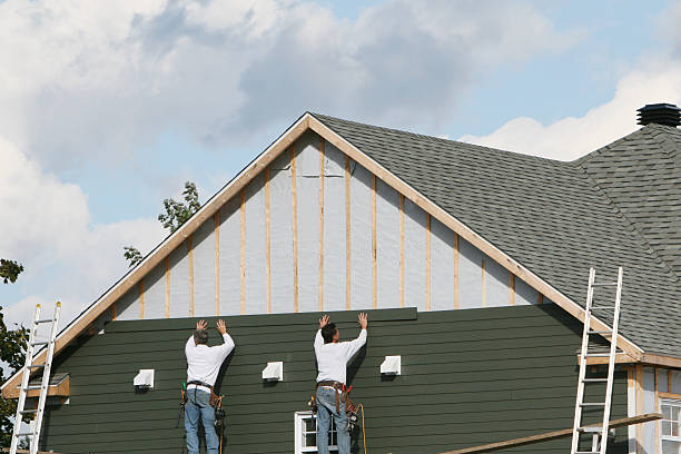 Professional Siding Contractor technician working in Candor, NC
